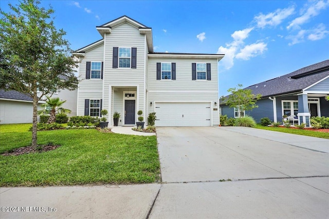 front facade featuring a front yard and a garage