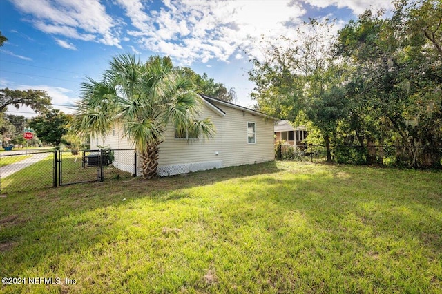 exterior space with a yard