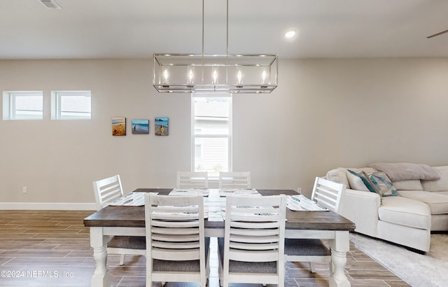 dining space featuring hardwood / wood-style floors