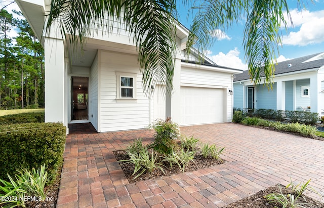 ranch-style home with a garage