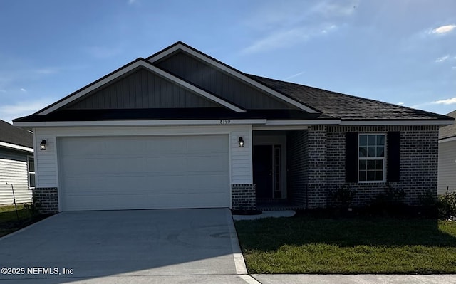 ranch-style home with an attached garage, concrete driveway, and brick siding