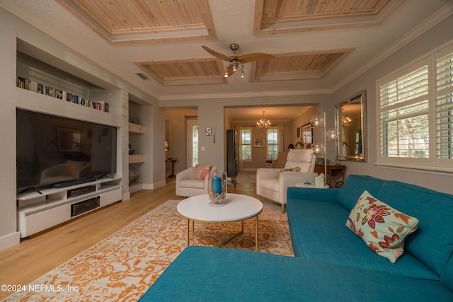 living room with ornamental molding, hardwood / wood-style floors, and plenty of natural light