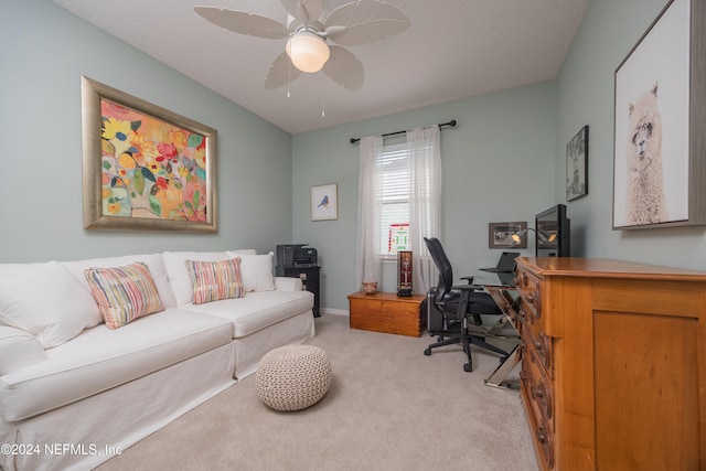 office space with light colored carpet and ceiling fan