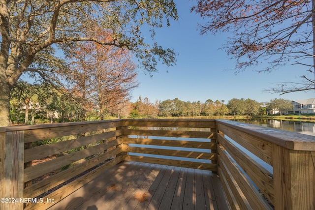 deck featuring a water view