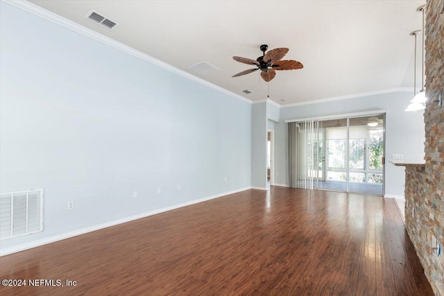 unfurnished living room featuring hardwood / wood-style flooring, ceiling fan, and crown molding