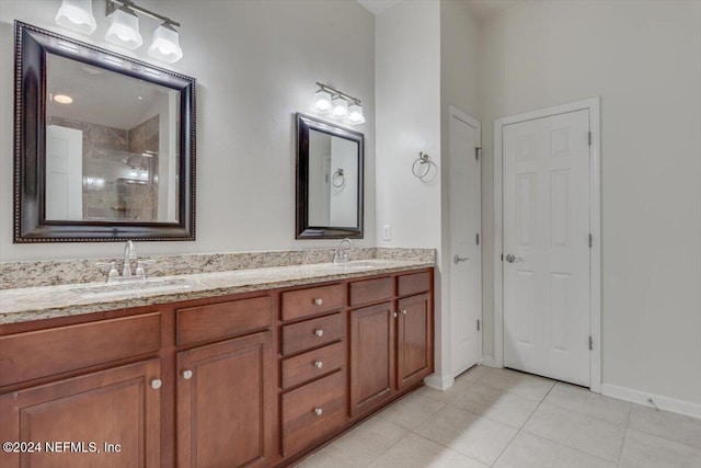 bathroom featuring vanity and tile patterned flooring