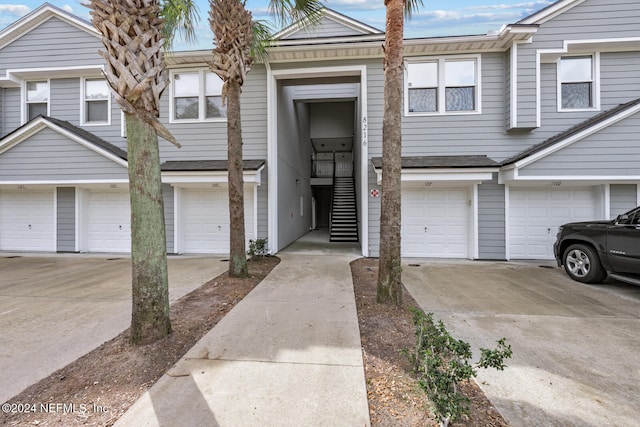 view of property with a garage