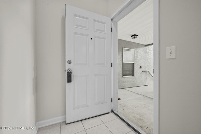 view of tiled foyer entrance