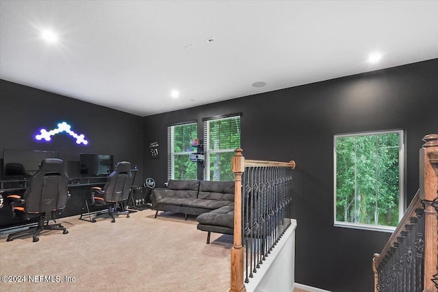 carpeted home office with a wealth of natural light