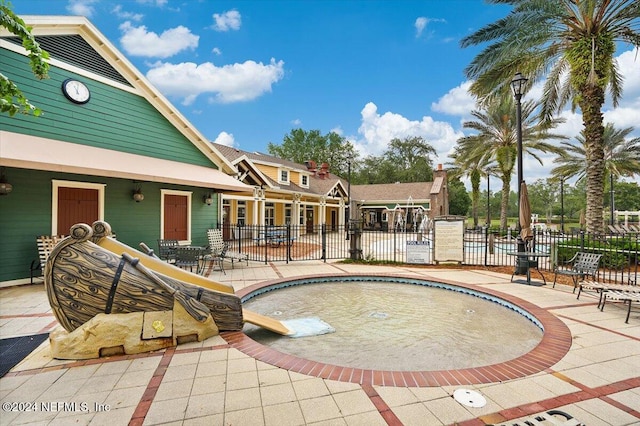 view of pool featuring a patio area