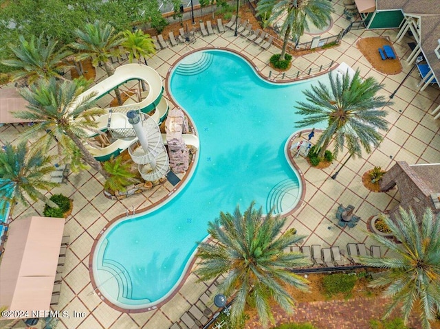 view of swimming pool featuring a patio area