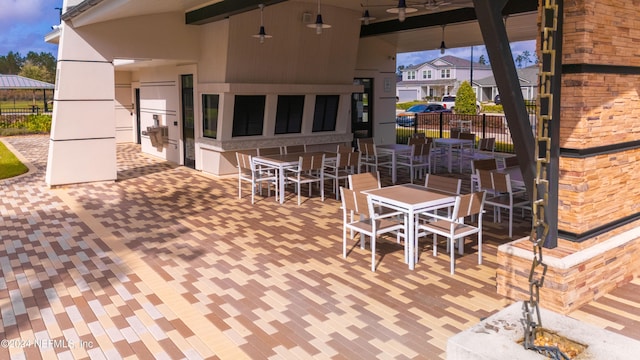 view of patio with ceiling fan