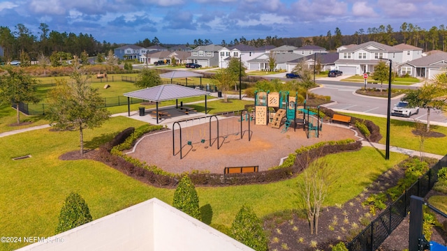 view of play area with a yard