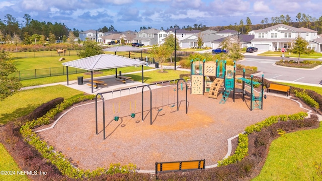 exterior space featuring a playground, a yard, and a gazebo