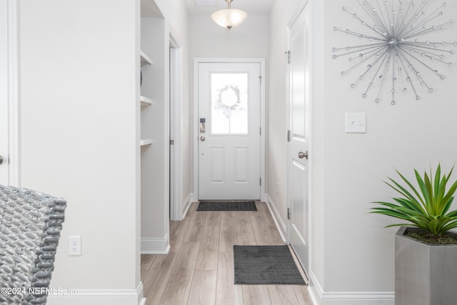 doorway to outside featuring light hardwood / wood-style floors