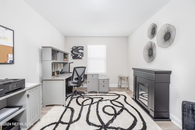 office area featuring light wood-type flooring