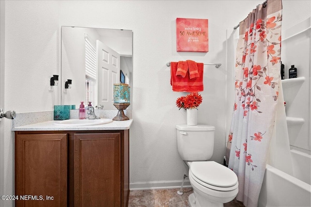 full bathroom featuring toilet, shower / tub combo, and vanity