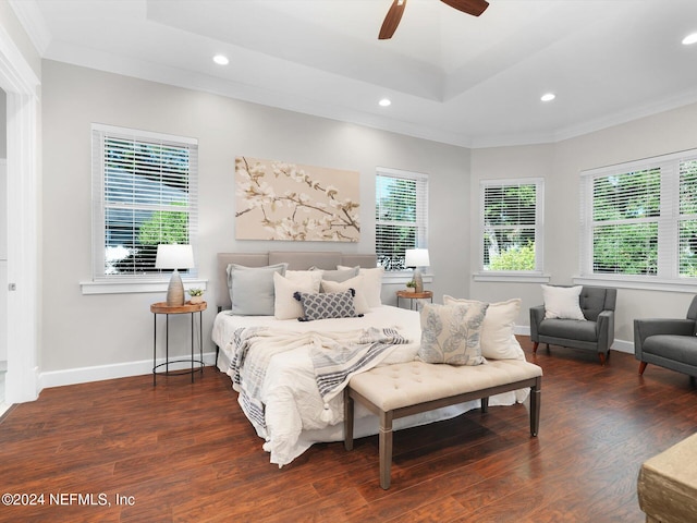 bedroom with dark wood-type flooring, ceiling fan, and crown molding