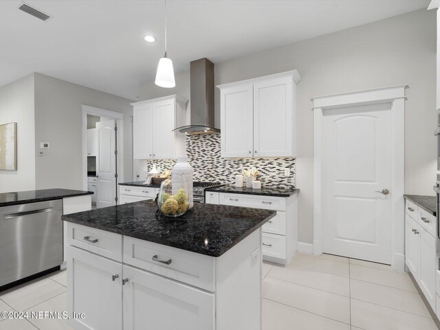 kitchen with a kitchen island, wall chimney range hood, decorative backsplash, white cabinets, and dishwasher