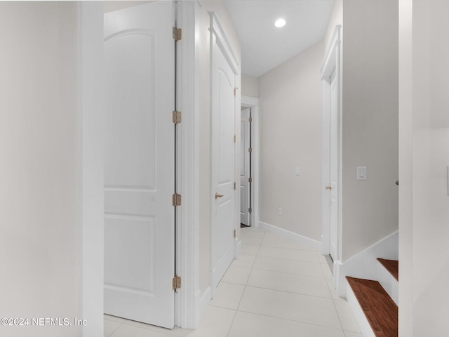 hallway with light tile patterned flooring