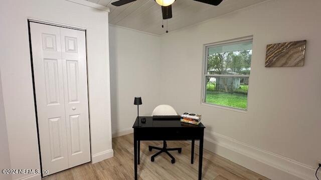 office area with light wood-type flooring and ceiling fan