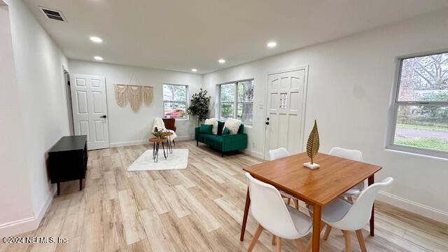 dining area with light wood-type flooring