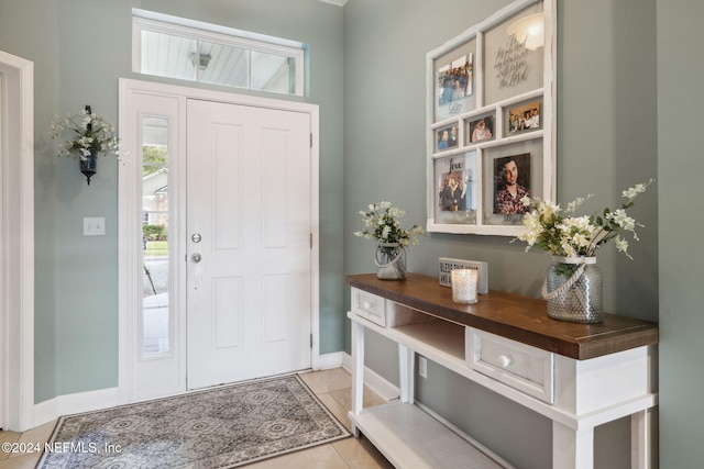 foyer entrance featuring light tile patterned floors