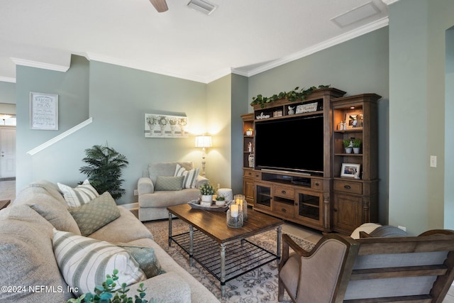 living room featuring crown molding