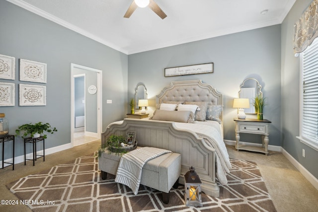 bedroom featuring carpet floors, ceiling fan, and crown molding