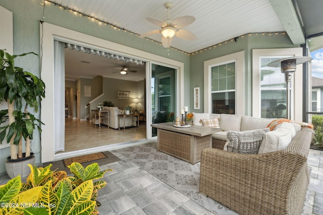 view of patio / terrace with ceiling fan and outdoor lounge area