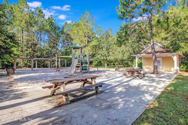 view of patio featuring a playground