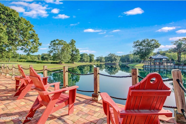 view of patio / terrace with a water view