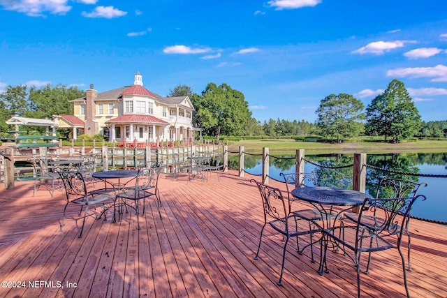 deck featuring a water view