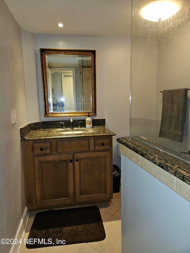 bathroom featuring vanity and tile patterned floors