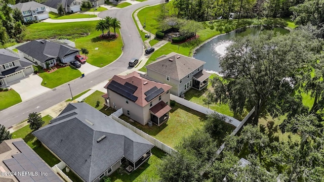 drone / aerial view with a water view