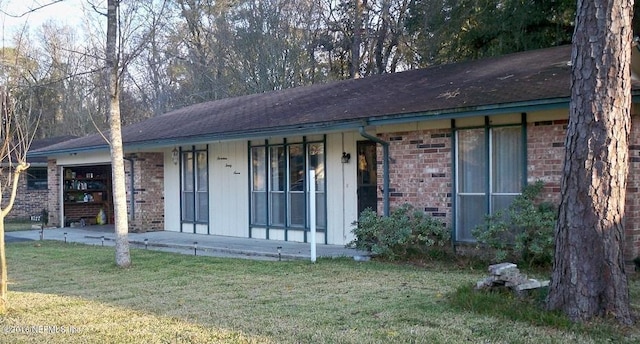 view of front of home with a front yard