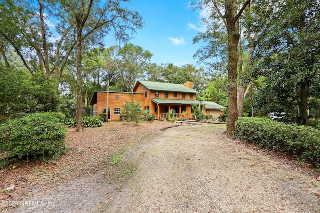 view of front of property featuring covered porch