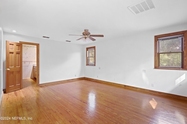 7816 Whispering Pines Ln, Glen St Mary, FL 32040 - unfurnished room with light wood-type flooring, ceiling fan, baseboards, and recessed lighting