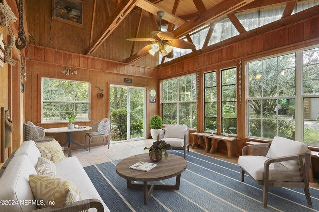 7816 Whispering Pines Ln, Glen St Mary, FL 32040 - sunroom / solarium featuring wood walls and tile patterned flooring