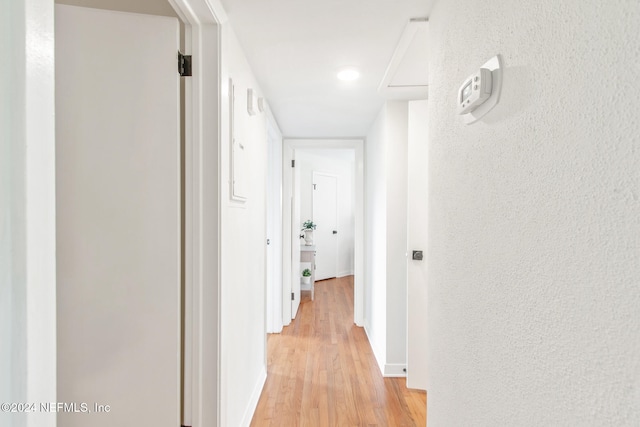 hallway featuring light wood-type flooring