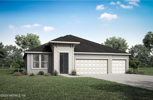 view of front facade with a garage and a front yard