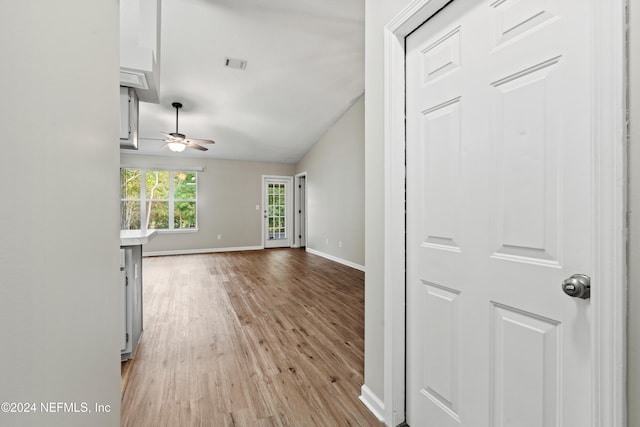 corridor featuring light hardwood / wood-style flooring