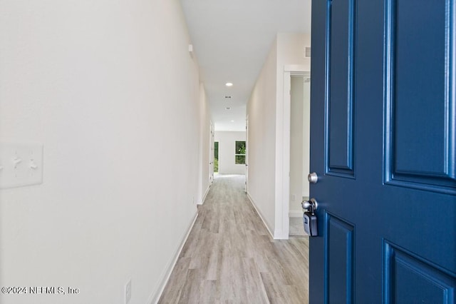 hall featuring light hardwood / wood-style floors