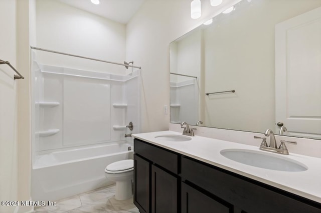 full bathroom featuring vanity, toilet, and bathing tub / shower combination