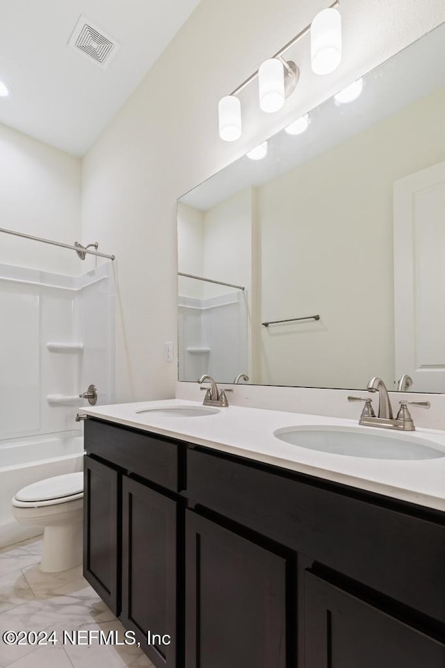 full bathroom featuring vanity, toilet, and shower / bathtub combination