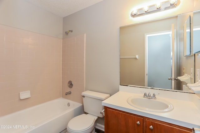 12229 Mastin Cove Rd, Jacksonville, FL 32225 - full bath featuring toilet, vanity, washtub / shower combination, and a textured ceiling