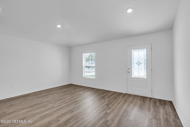 37343 Whisper Way, Hilliard, FL 32046 - foyer entrance with wood finished floors, baseboards, and recessed lighting