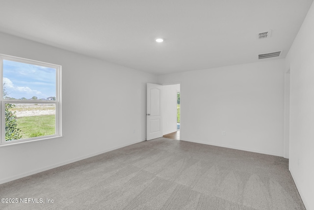 37343 Whisper Way, Hilliard, FL 32046 - carpeted spare room featuring healthy amount of natural light, recessed lighting, and baseboards
