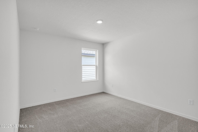 37343 Whisper Way, Hilliard, FL 32046 - unfurnished room with carpet floors and baseboards