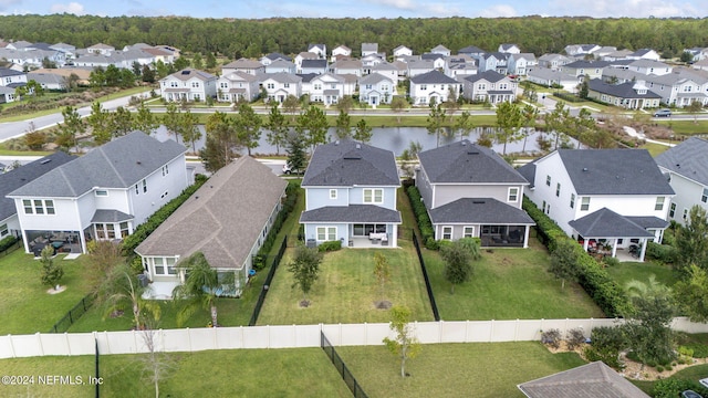 bird's eye view with a water view